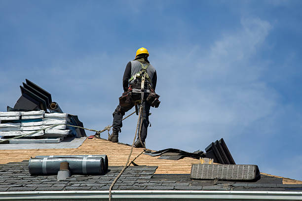 Professional Gutter Installation technician working in Buchtel, OH